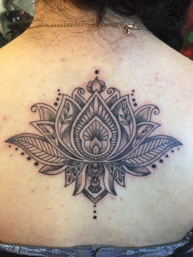 Explore year of the dragon tattoo ideas, creative tattoo ideas in Tampa, available at Angel Tattoo