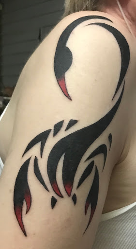 Explore pinup tattoo ideas, creative tattoo ideas in Auburndale, available at Till Death Tattoo Studio