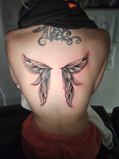 Explore grumpy bear tattoo ideas, creative tattoo ideas in Angola, available at Hoodlum Ink