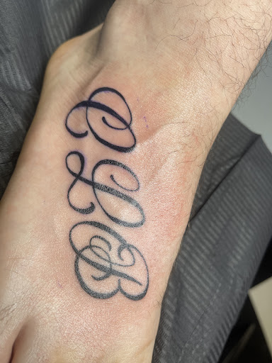 Explore love music tattoo ideas, creative tattoo ideas in Corpus Christi, available at Purple Ink - Tattoo & Piercing Studio