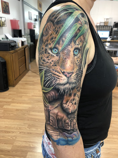 Explore female face tattoo ideas, creative tattoo ideas in Sarasota, available at SEVEN SINS Tattoo Studio