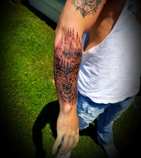 Explore black sleeve tattoo ideas, creative tattoo ideas in Conway, available at Primal Urge Tattoos