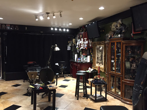 Explore stomach tattoo ideas for guys, creative tattoo ideas in Milford, available at Grindhouse Gallery Tattoo