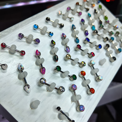 Explore upper back tattoo cover up ideas, creative tattoo ideas in Brighton, available at Branch Out Studios - Tattoo & Piercing Lounge