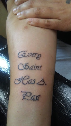 Explore simple silver lining tattoo ideas, creative tattoo ideas in Sedalia, available at Skin Thieves Tattoo Studio