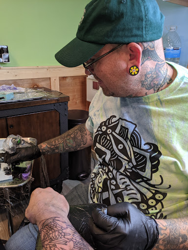 Explore widow tattoo ideas, creative tattoo ideas in Powell, available at Hummingbird Tattoo Studio