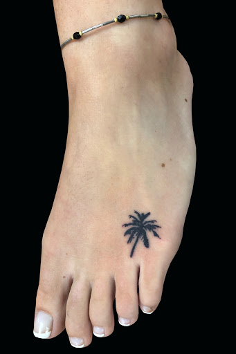 Explore female side tattoo ideas, creative tattoo ideas in Lahaina, available at Sweet Trade Tattoo