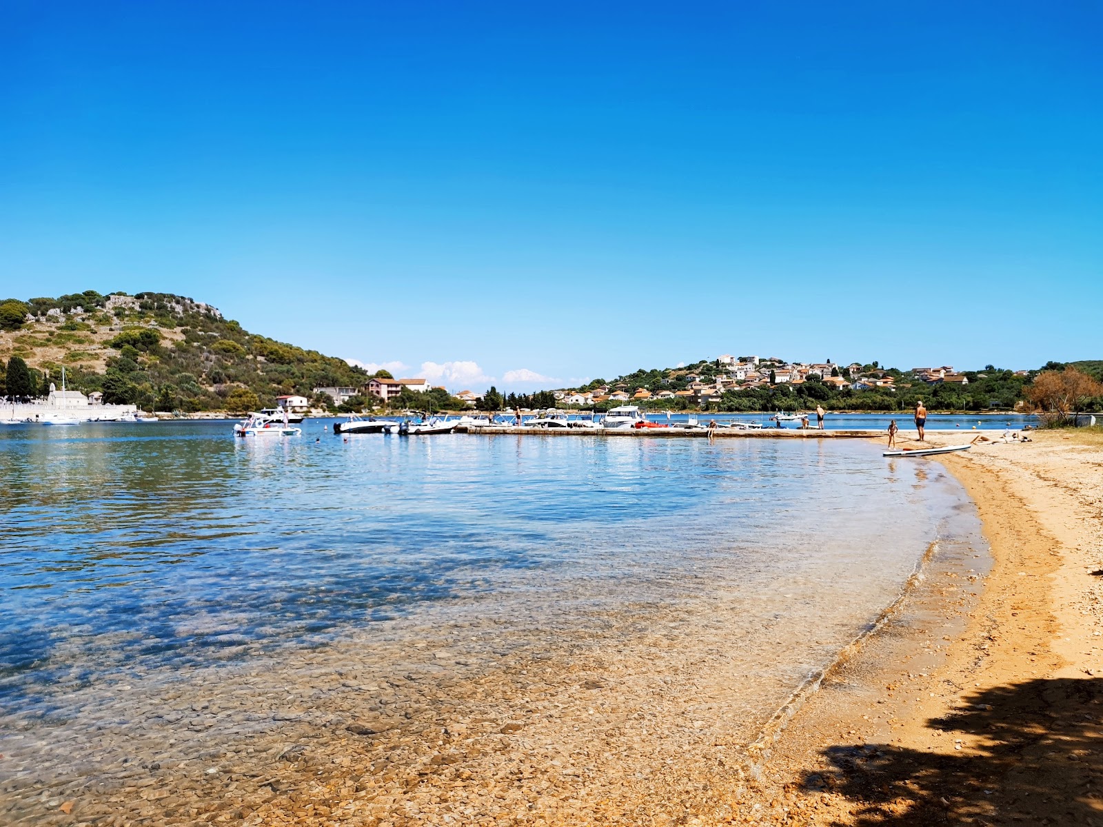 Foto von Przina Beach mit beiger sand & steine Oberfläche