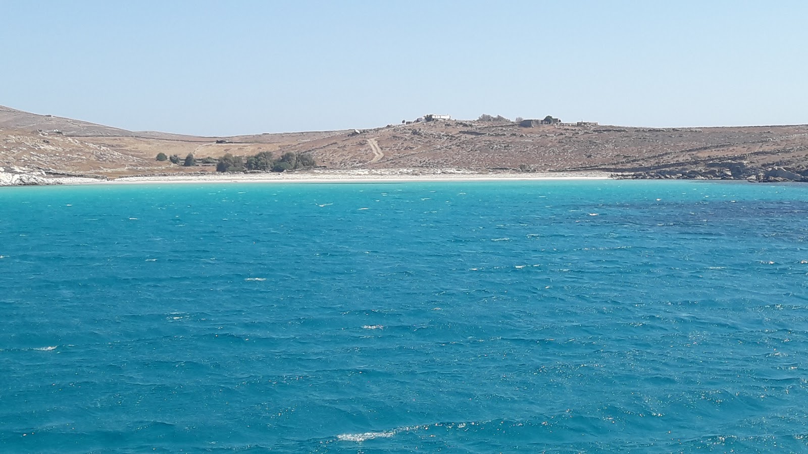 Photo of lygias beach with turquoise pure water surface