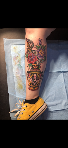 Explore throat tattoo ideas for females, creative tattoo ideas in Sioux Falls, available at Heart Tattoo