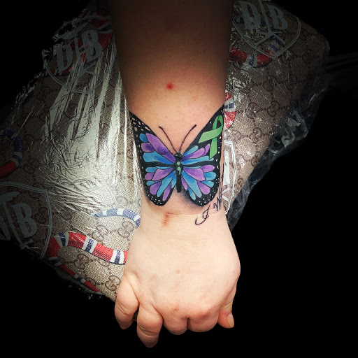 Explore tattoo name ideas for men, creative tattoo ideas in Bridgeport, available at Breaking skin tattoo and body piercing