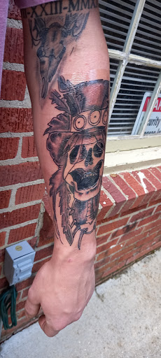 Explore inner bicep tattoo ideas for men, creative tattoo ideas in Meridian, available at SK-Tattoo1
