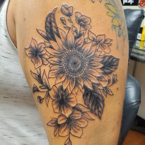 Explore coal mining tattoo ideas, creative tattoo ideas in Altoona, available at Black Dragon Tattoo
