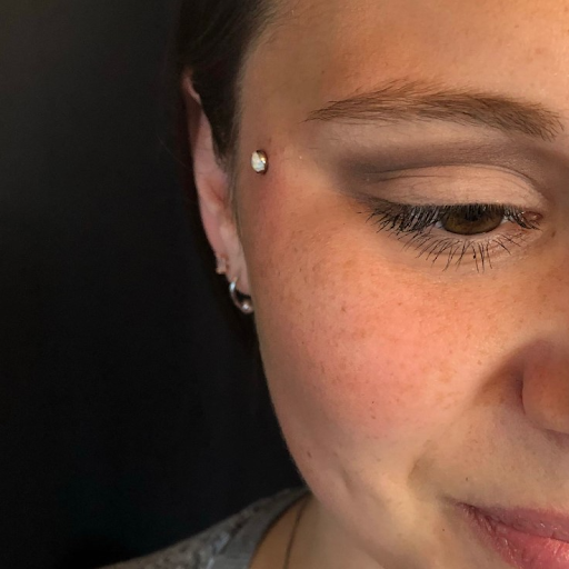 Explore belly button tattoos ideas, creative tattoo ideas in Medford, available at Agave in Bloom Piercing & Fine Jewelry