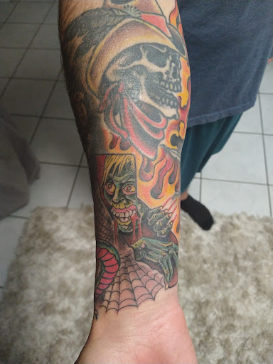 Explore football tattoo ideas, creative tattoo ideas in Clearwater, available at Moniques Body Art