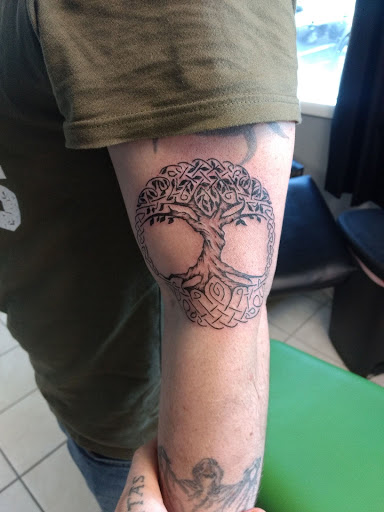 Explore name chris tattoo ideas, creative tattoo ideas in Milan, available at Apocalyptic Ink Studio