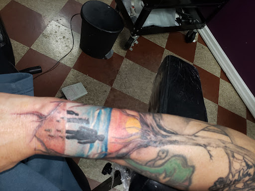 Explore lone wolf tattoo ideas, creative tattoo ideas in Lima, available at Legacy Ink Tattoo