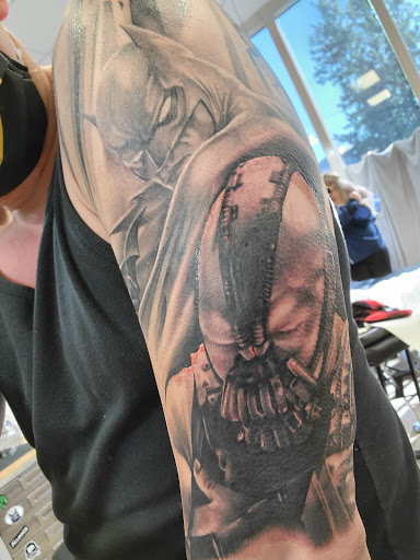 Explore ateez tattoo ideas, creative tattoo ideas in Watertown, available at Bare Knuckle Tattoo