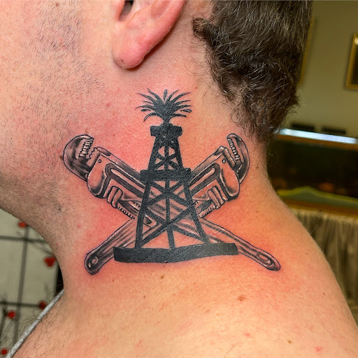 Explore skier tattoo ideas, creative tattoo ideas in Watford City, available at Soulful Ink Studios