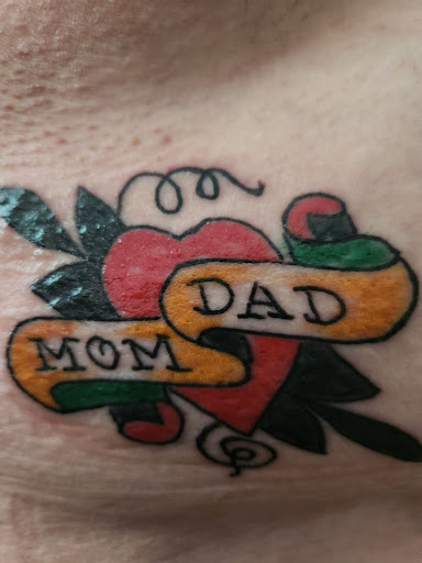 Explore male wedding ring tattoo ideas, creative tattoo ideas in Dunn, available at Yankee Tattoo and Piercing