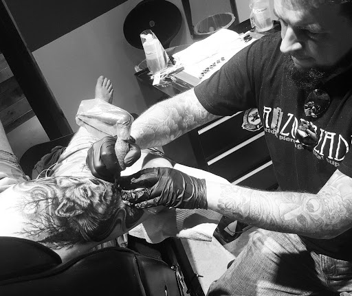 Explore tattoo ideas for mothers with sons, creative tattoo ideas in Atlanta, available at Empyrean Tattoo Studio