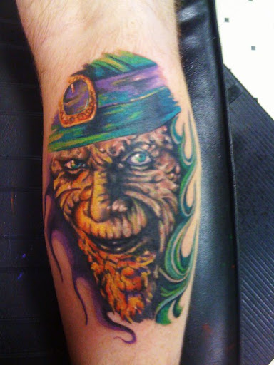 Explore green tattoo ideas, creative tattoo ideas in Clinton, available at Ritual Custom Tattoos