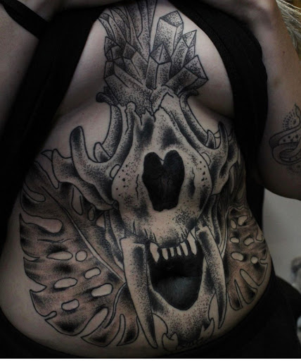 Explore chest tattoo ideas for females, creative tattoo ideas in Southaven, available at Illusion Ink