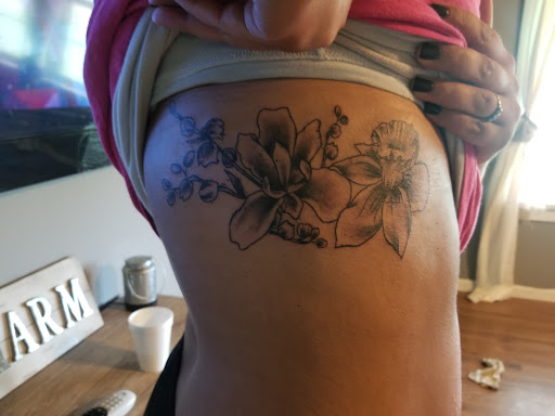 Explore tattoo for mom and dad ideas, creative tattoo ideas in Southaven, available at Illusion Ink