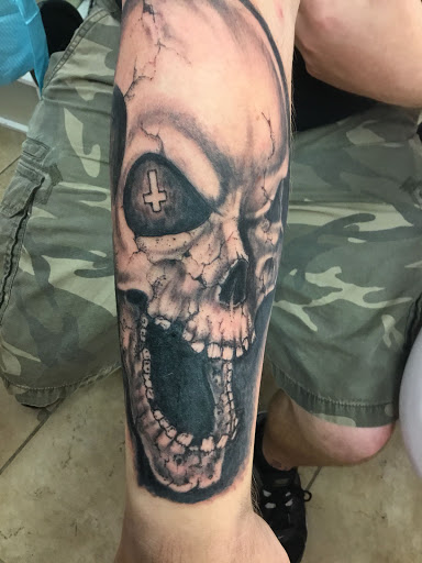 Explore c section scar tattoo ideas, creative tattoo ideas in Satellite Beach, available at Rocksteady Tattoo Company