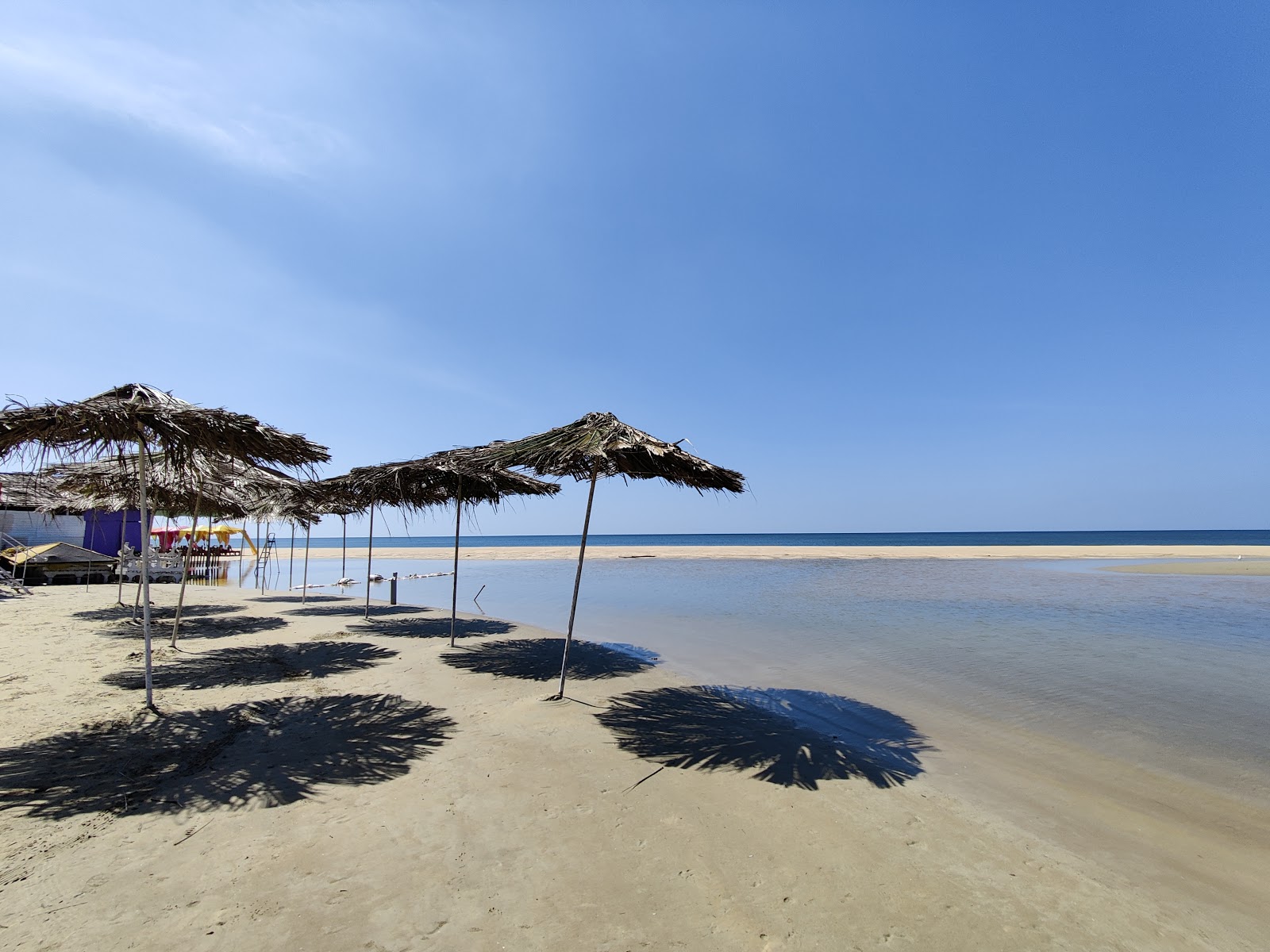 Photo of Utorda Beach and the settlement