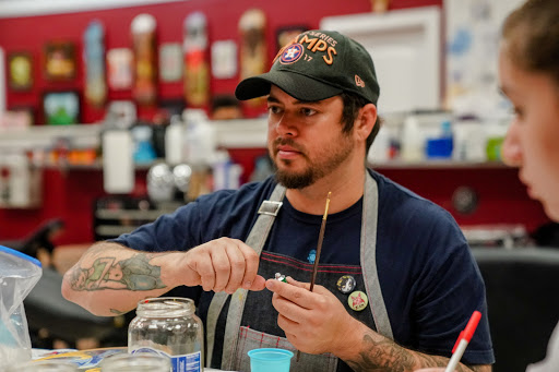 Explore stretch mark tattoo ideas, creative tattoo ideas in Katy, available at Artistic Impressions Tattoo Studio