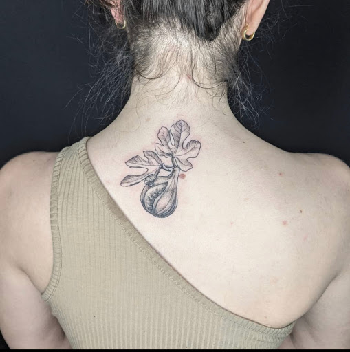 Explore black men tattoo ideas, creative tattoo ideas in Charlotte, available at Canvas Tattoo & Art Gallery