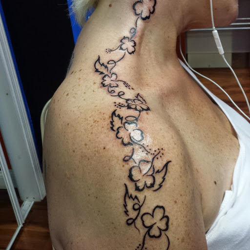 Explore tattoo ideas for top of foot, creative tattoo ideas in Indianapolis, available at A-1 Art Tattoos LLC