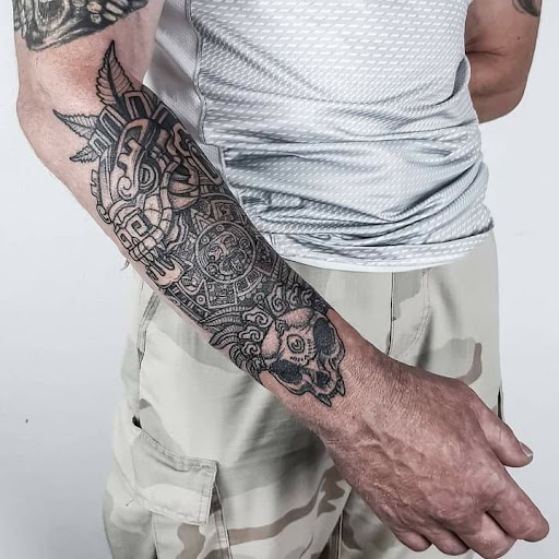 Olaf Kaminskiy tattoo