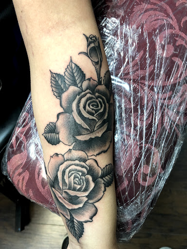 Explore side hand tattoo ideas, creative tattoo ideas in Jacksonville, available at Idle Hands Tattoo Co.