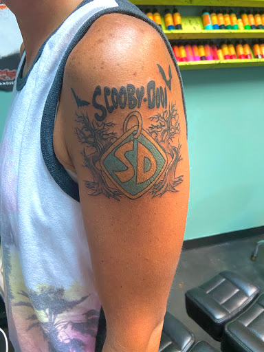 Explore western sleeve tattoo ideas, creative tattoo ideas in Meridian, available at Creative Pain Tattoo Studio