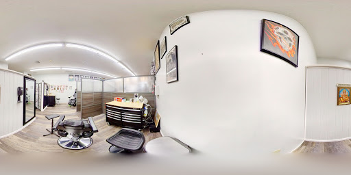 Explore cover up lower back tattoo ideas, creative tattoo ideas in East Stroudsburg, available at RockN Willys Tattoo & Piercing