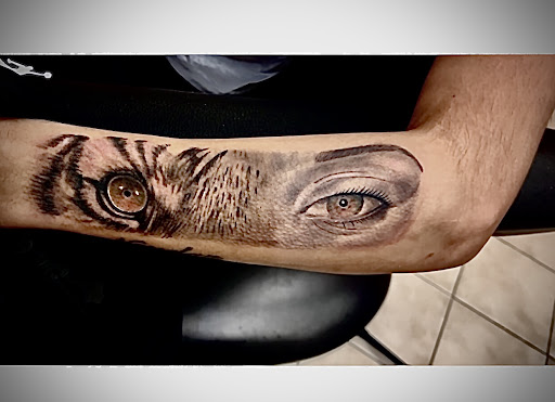 Explore tattoo 3/4 sleeve ideas, creative tattoo ideas in Holyoke, available at Bloodlines Tattoo and Piercing