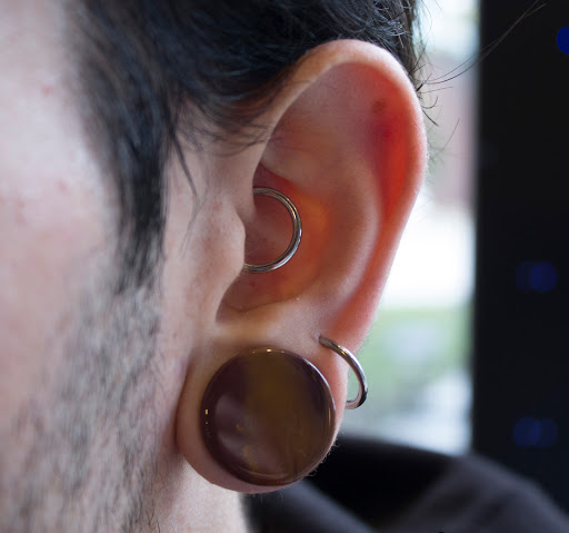 Explore fine line finger tattoo ideas, creative tattoo ideas in Bloomington, available at Smokin Aces Tattoo Company