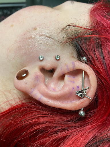 Explore cool female tattoo ideas, creative tattoo ideas in Jacksonville, available at Pokes By Liz