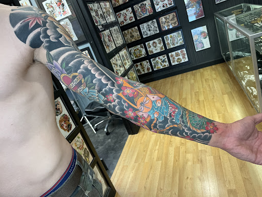 Explore tattoo ideas mother and son, creative tattoo ideas in Wayne, available at Tattoo Factory