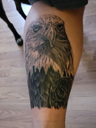 Explore in god we trust tattoo ideas, creative tattoo ideas in Hermitage, available at Lone Wolf Tattoo Nashville