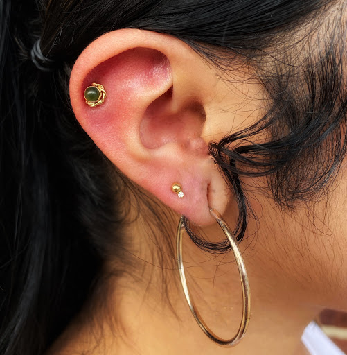 Explore female memorial tattoo ideas, creative tattoo ideas in Greensboro, available at Fern Piercing and Fine Jewelry