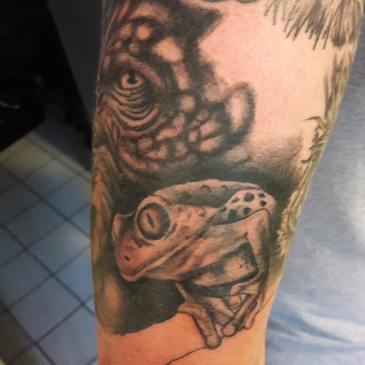 Explore hand tattoos ideas for men, creative tattoo ideas in Panama City Beach, available at Revolution Tattoo & Body Piercing