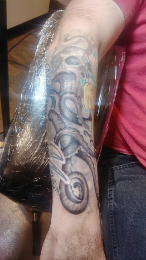 Tattoo Shop «Pincushns», reviews and photos, 214 College Ave, Holland, MI 49423, USA