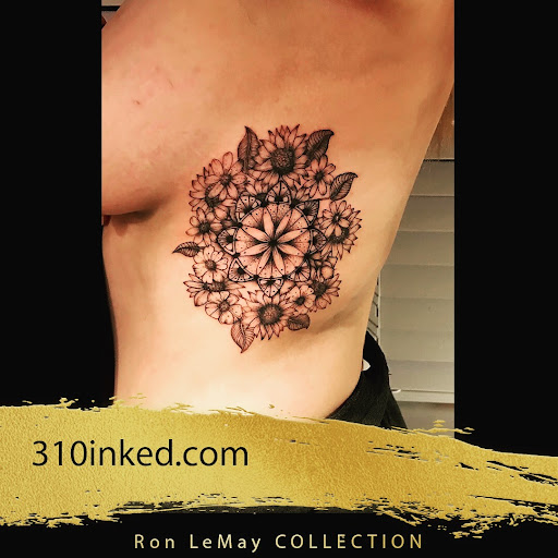Explore female stomach tattoo ideas, creative tattoo ideas in Spokane, available at Ron LeMay Tattoo