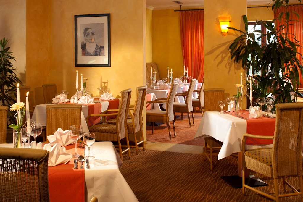 Garden Restaurant. Lounge. Terrasse & Frühstücksrestaurant im Vital Hotel