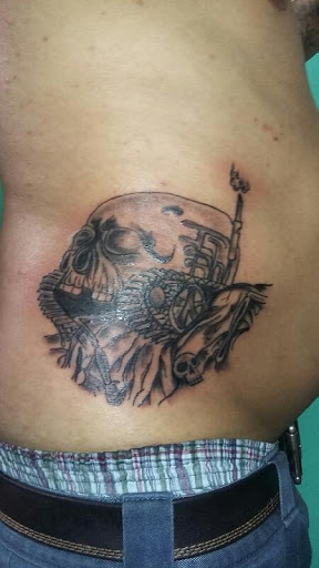 Explore princess and the frog tattoo ideas, creative tattoo ideas in Paris, available at Madhouse tattoo