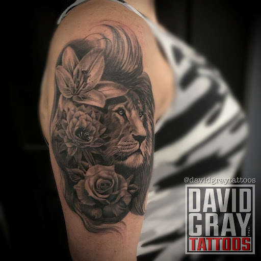 Explore mirrored tattoo ideas, creative tattoo ideas in Davison, available at Trainwreck Tattoo Studio