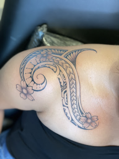 Explore neck tattoo ideas for guys, creative tattoo ideas in Honokaa, available at Hawaii based tattoo